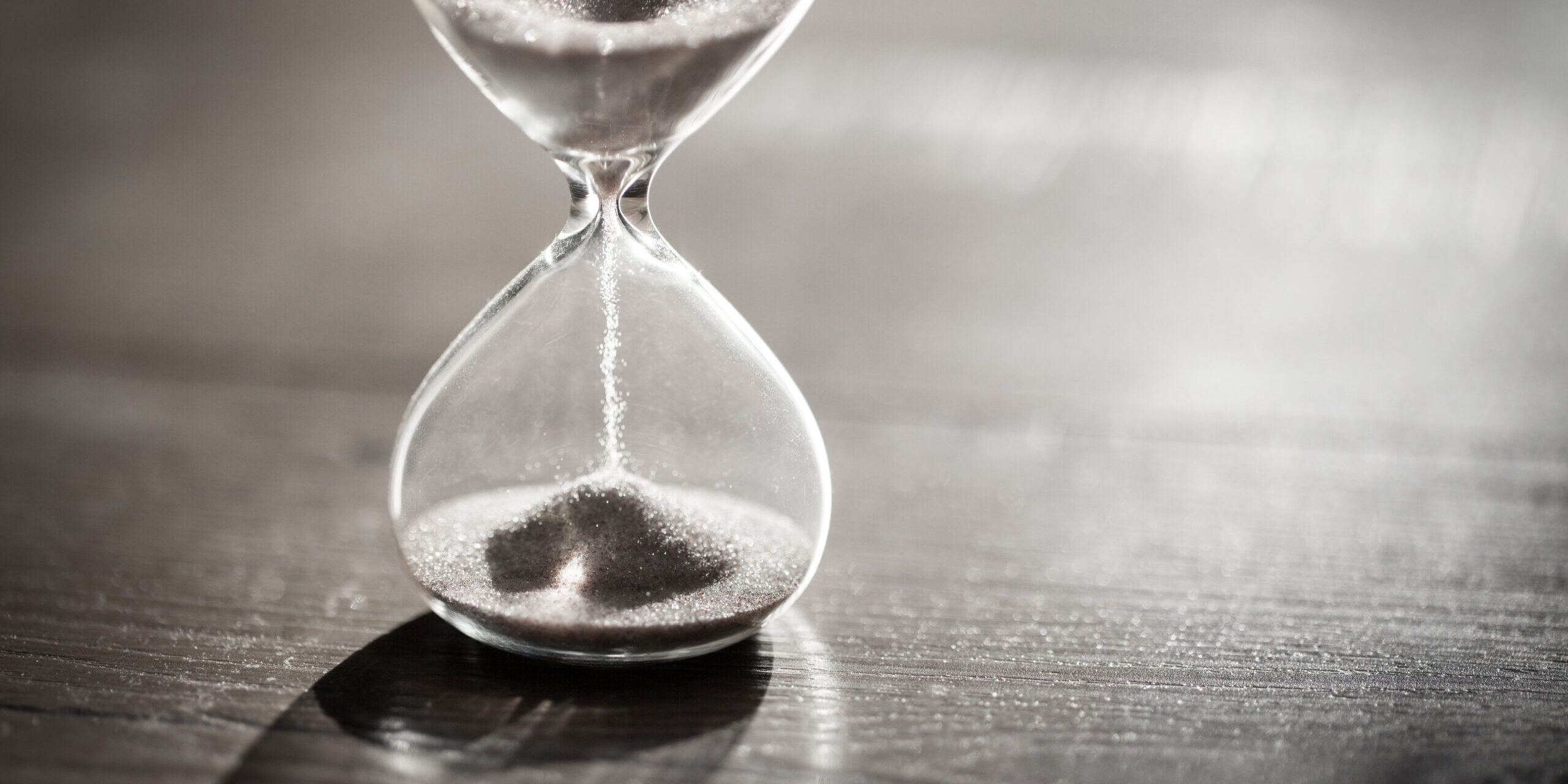 Sand,Running,Through,The,Bulbs,Of,An,Hourglass,Measuring,The