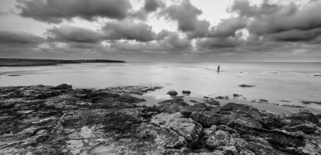 Lonely,Fisherman,Standing,In,The,Water,At,Sunrise,,At,Dor